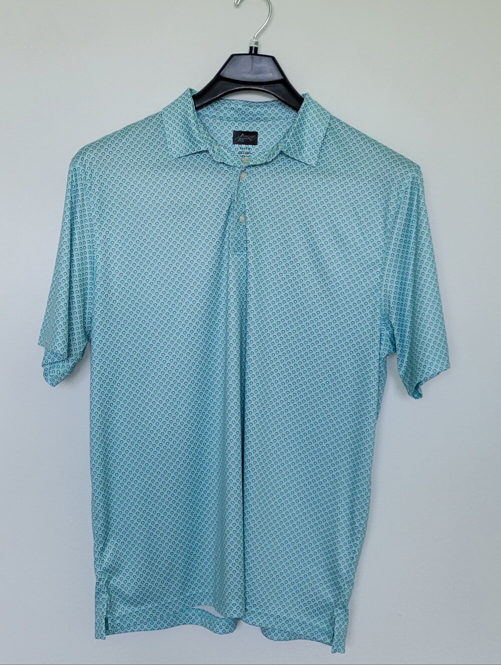 Greg Norman Men’s Teal Geometric Performance Golf Polo Shirt